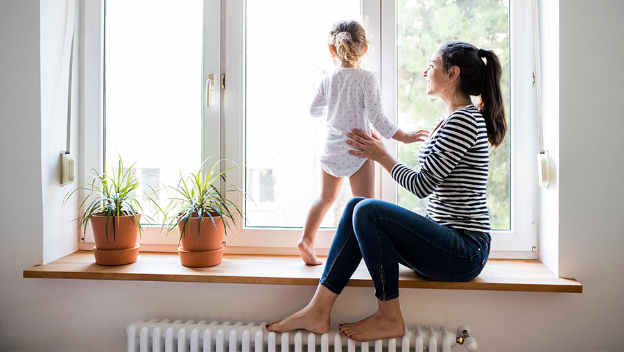 Mother watching her daughter