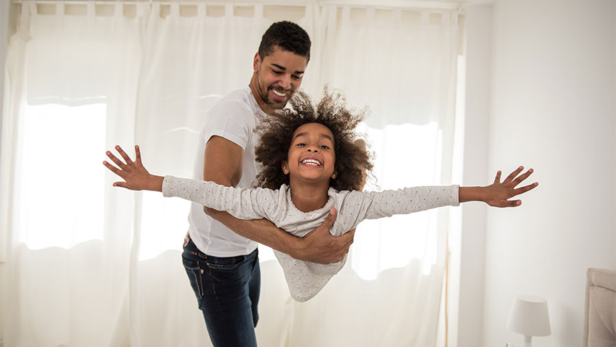 Father and daughter playing