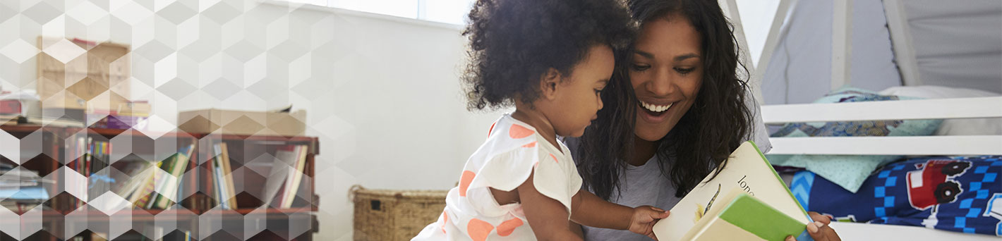 Mother and daughter reading book