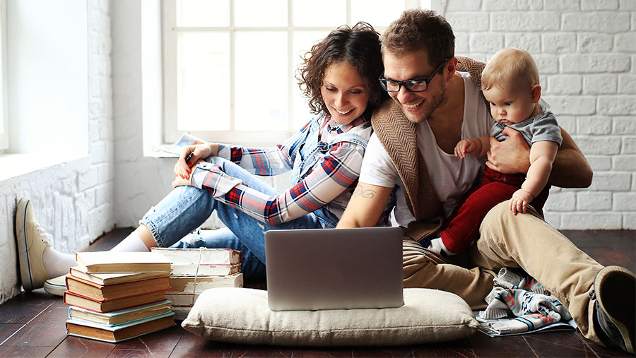 Family looking on a laptop